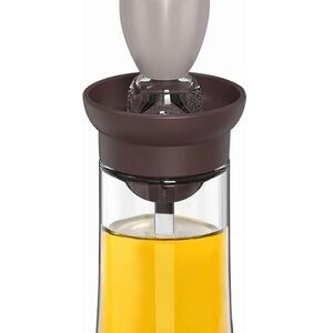 Brown and Gray Oil Dispenser